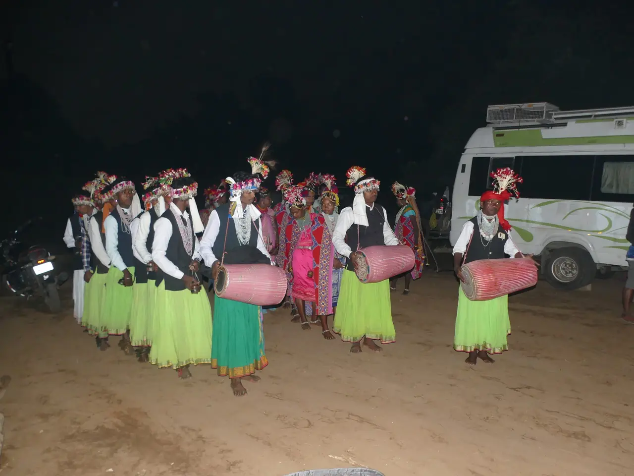 Traditional Kodava folk drummers performing at night, Theralu Village