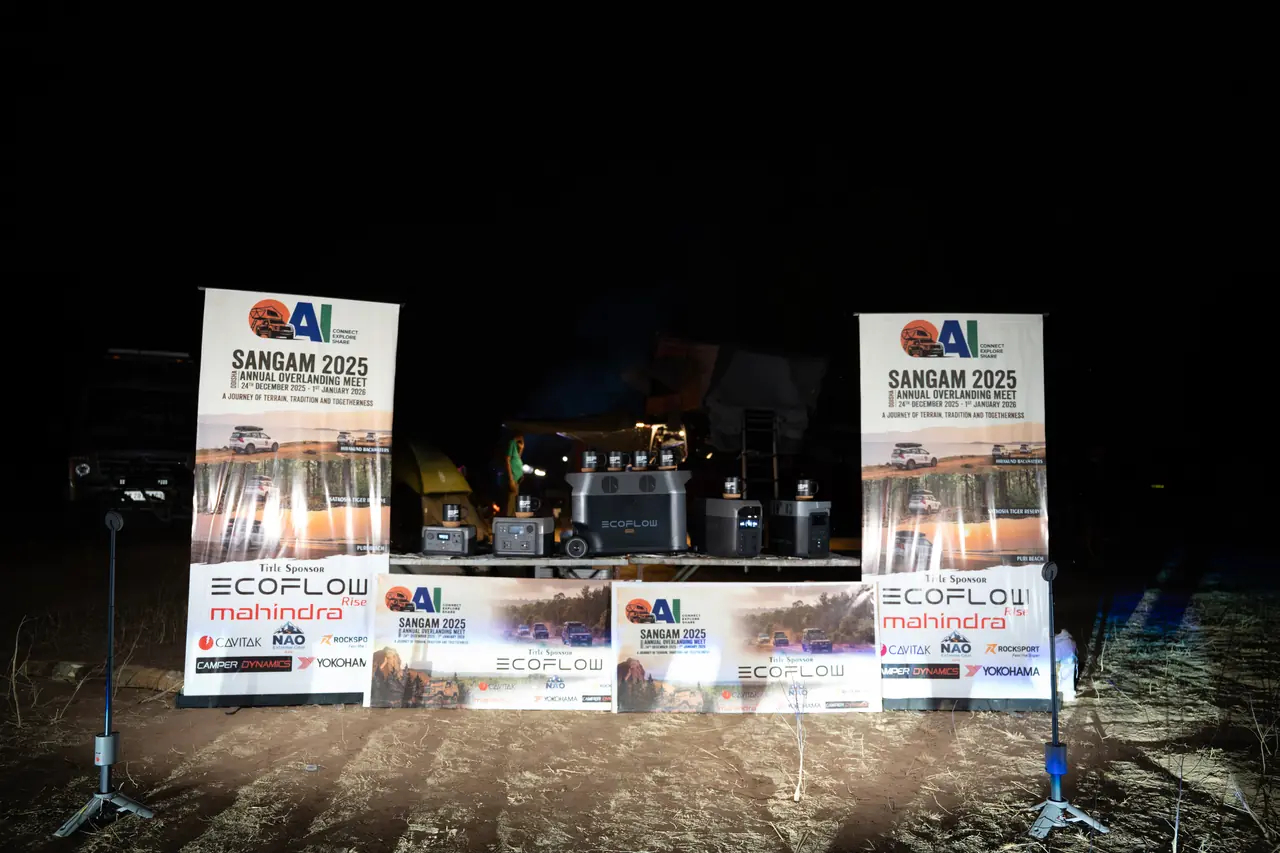 The sponsor stage lit up at night at the Hirakud campsite
